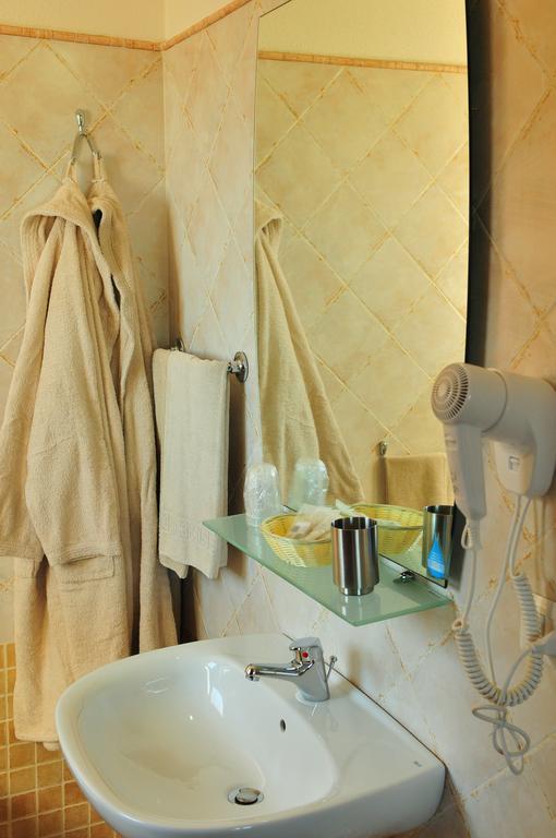 Hotel Castello Budoni Pokoj fotografie